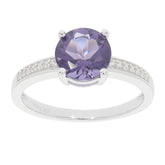 Round purple sapphire sterling silver ring with accent stones, showcasing luxury and elegance.